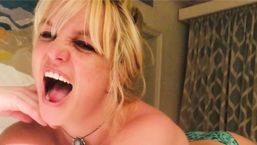 Britney Spears lounges indoors in bikini