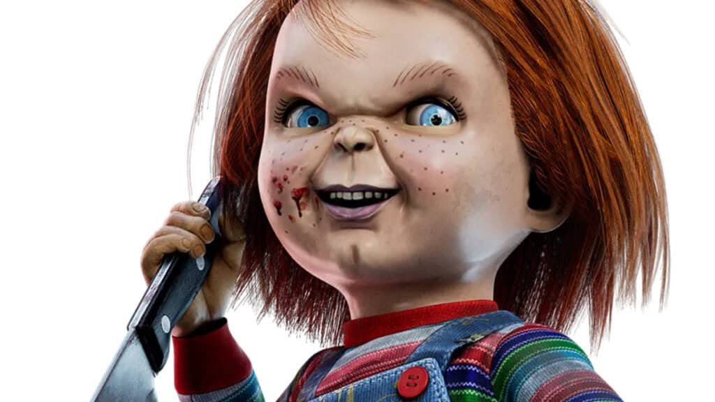 Chucky poses with a knife raised