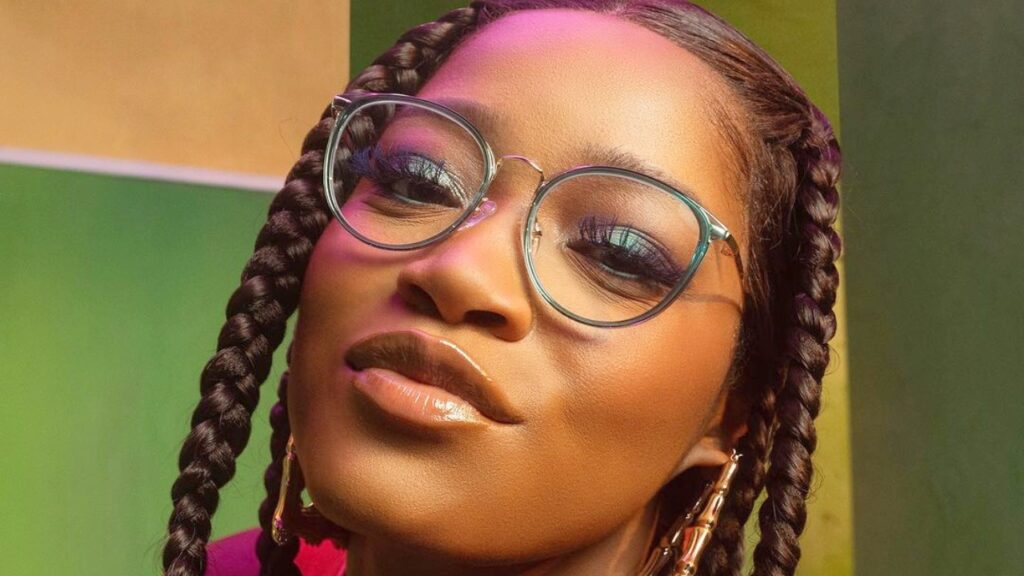 Keke Palmer rocks braided hair and eyeglasses