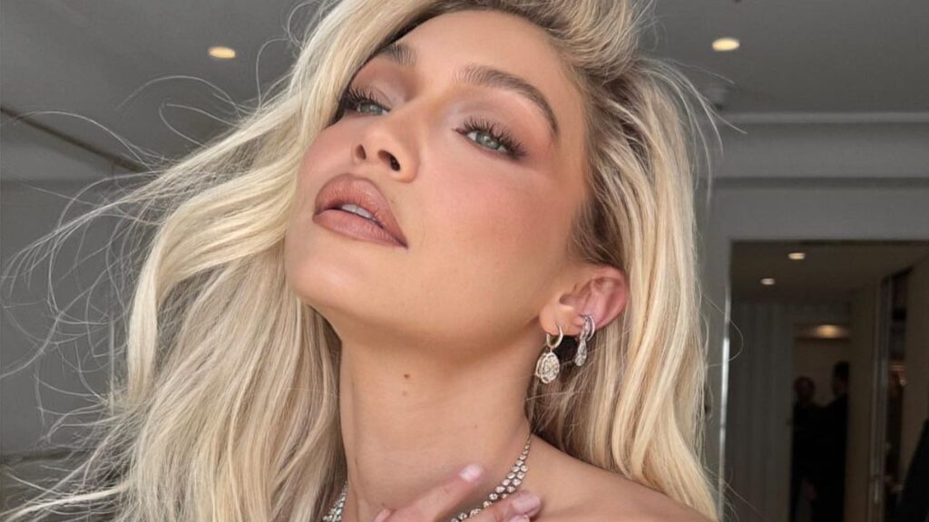 Gigi Hadid poses in strapless dress