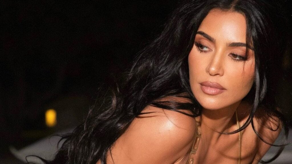 Kim Kardashian in gold swimwear during Puglia Vacay