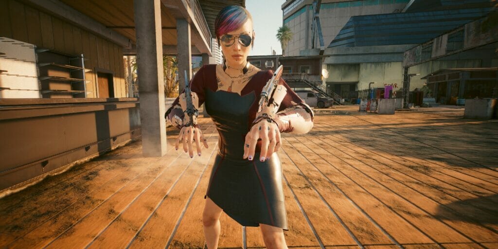 V poses on the boardwalk in Cyberpunk 2077