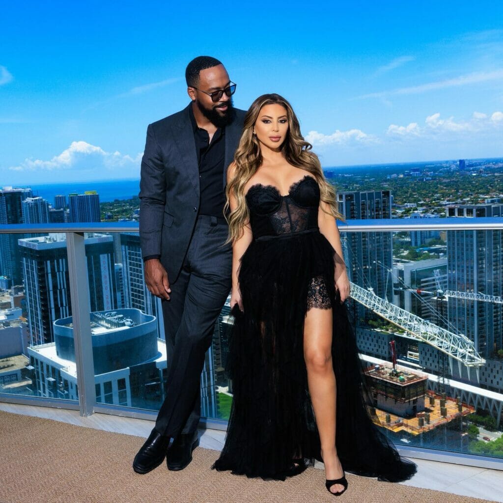 Larsa Pippen and Marcus Jordan posing