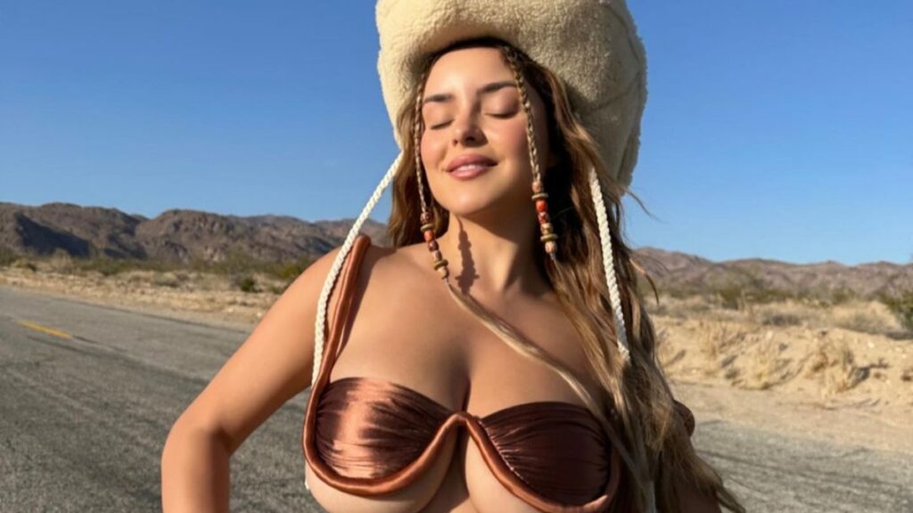 Demi Rose soaks up the sun in swimwear