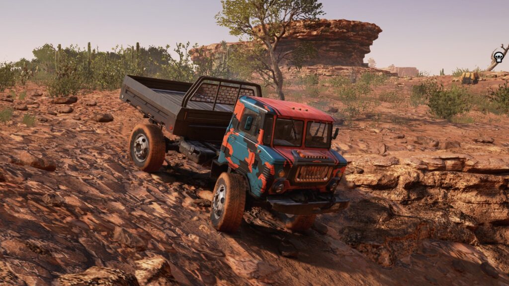 A truck descends a rocky slope