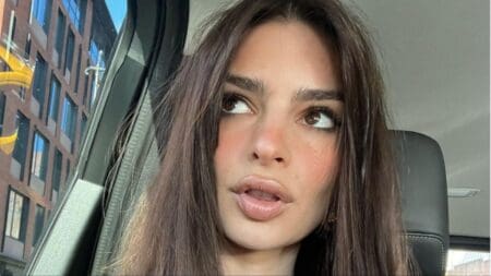 Emily Ratajkowski clicks a selfie in her car