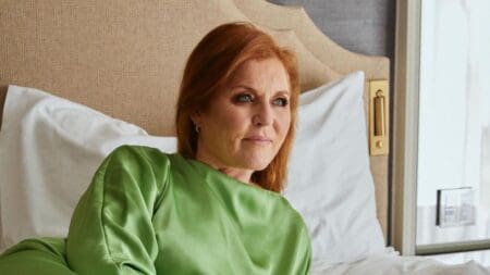 Sarah Ferguson poses in a green dress