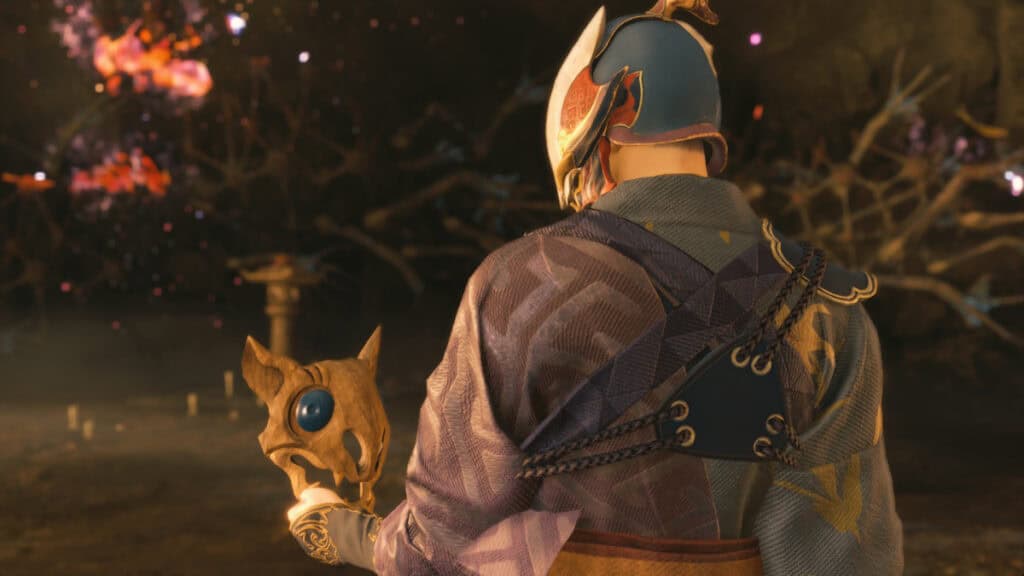 Soh holding the Thief's mask