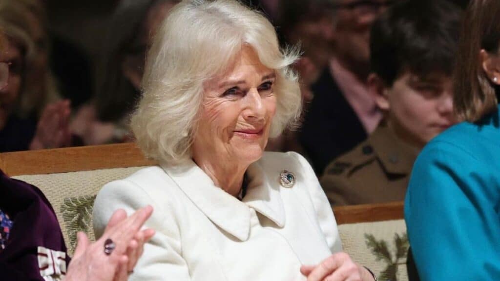 Queen Camilla in a white dress