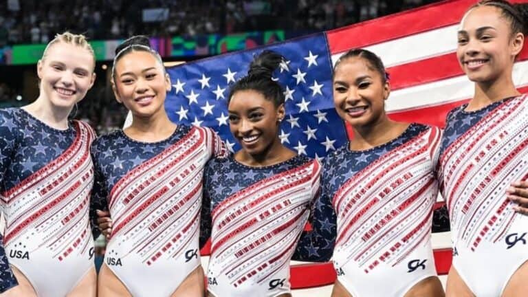 Simone Bile and the USA Women's gymnastics team at the Olympics after historic win