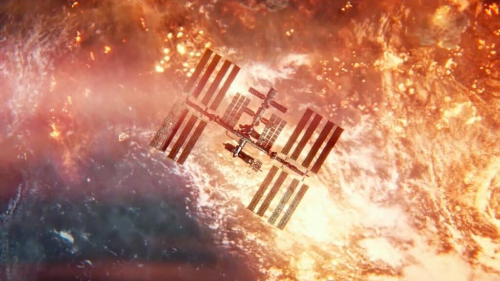 A shot from I.S.S., showing the space station against a backdrop of earth as nuclear bombs go off