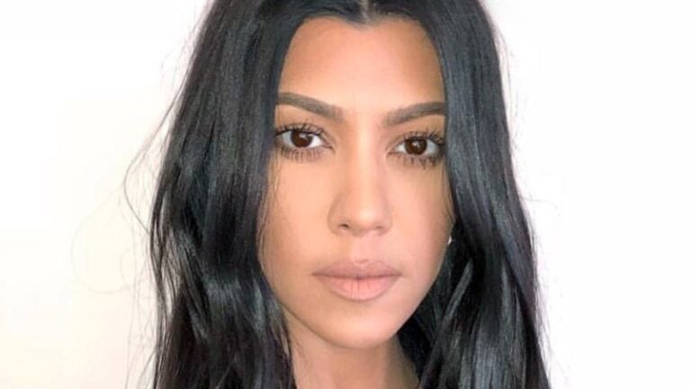 Kourtney Kardashian poses close up