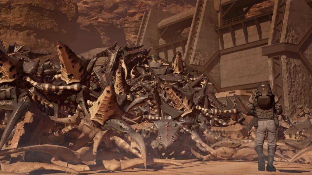 Dead alien bugs piled atop one another in Starship Troopers: Extermination