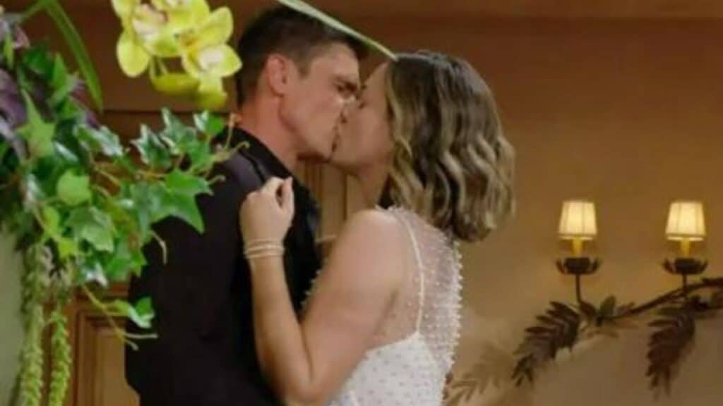 The Bold and the Beautiful characters Finn and Hope Logan kissing.