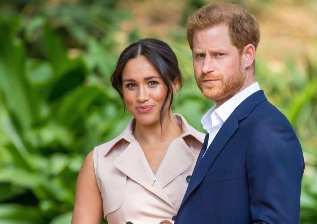 Prince Harry and Meghan Markle pose for a photo