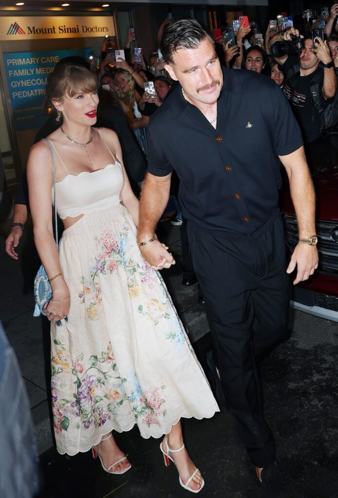 Taylor Swift and Travis Kelce cause fan frenzy leaving Karen Elson’s star-studded wedding at Electric Lady Studios in NYC.