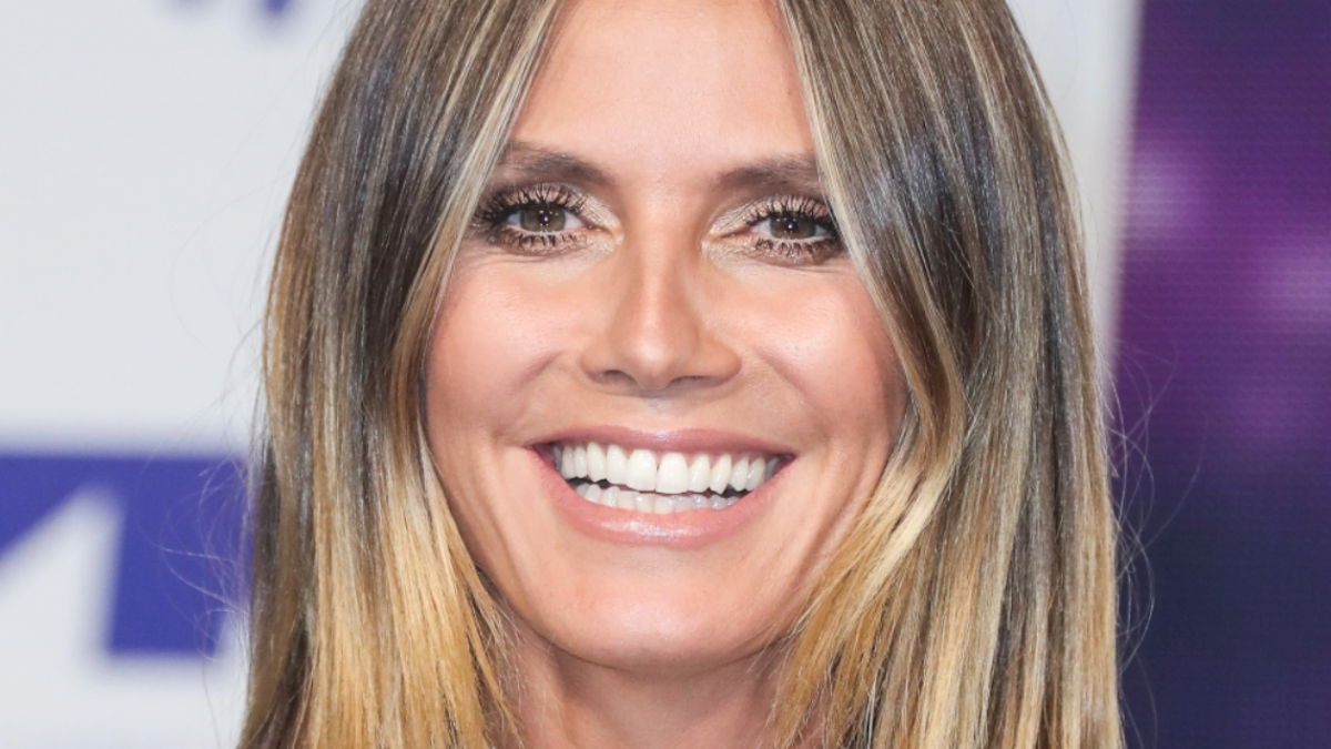 Heidi Klum In Leggy Minidress Shows Off Her 'Sausages'