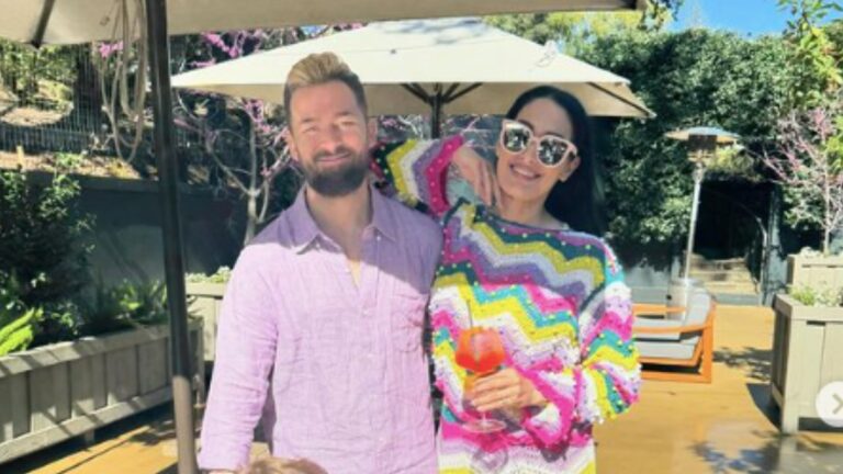 Nikki Garcia and husband Artem Chigvintsev pose for a photo in happier times.