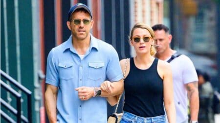 Blake Lively and Ryan Reynolds walk arm-in-arm while out for a morning stroll in NYC.