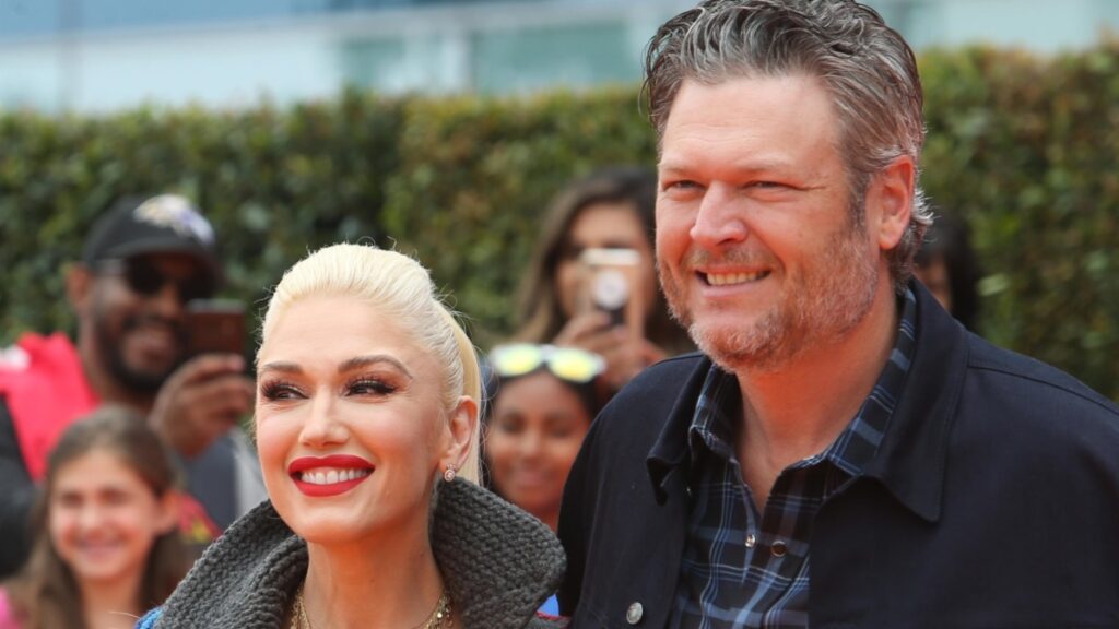 Gwen Stefani and Blake Shelton at an event.