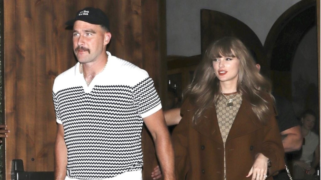 Taylor Swift and Travis Kelce hold hands on date night.