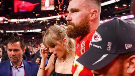 Kansas City Chiefs tight end Travis Kelce (87) celebrates with girlfriend and entertainer Taylor Swift after a 25-22 win over the San Francisco 49ers during Super Bowl LVIII