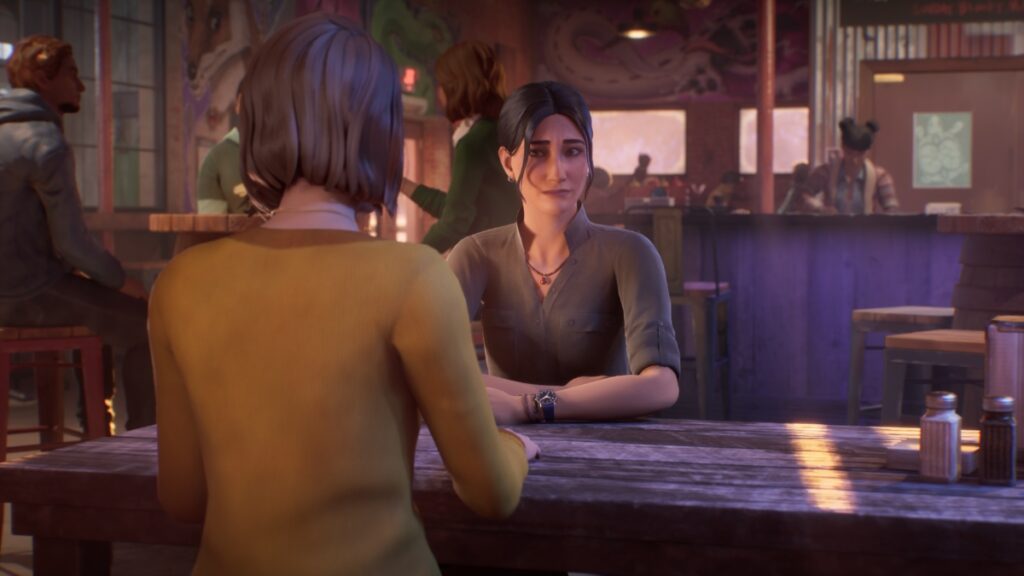 Max and Safi hang out in the cafe in Life Is Strange: Double Exposure