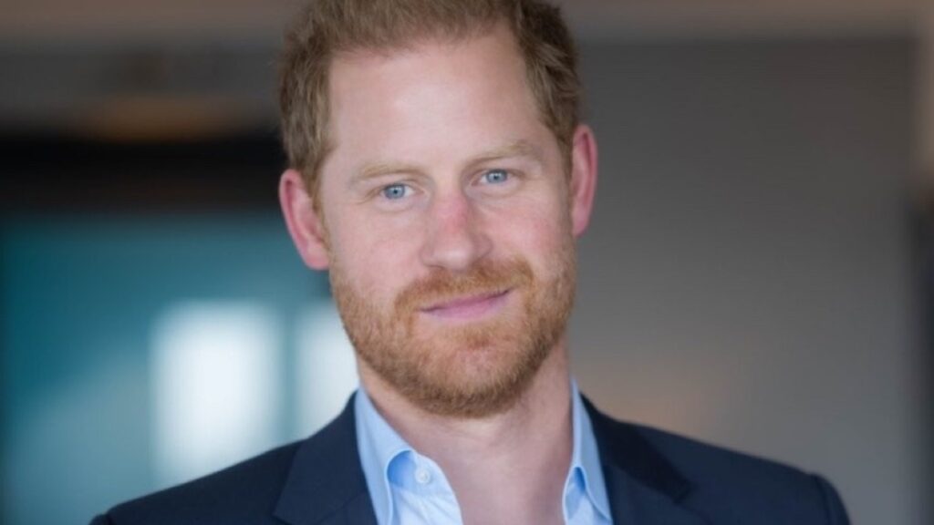 Photo of Prince Harry in a black suit.