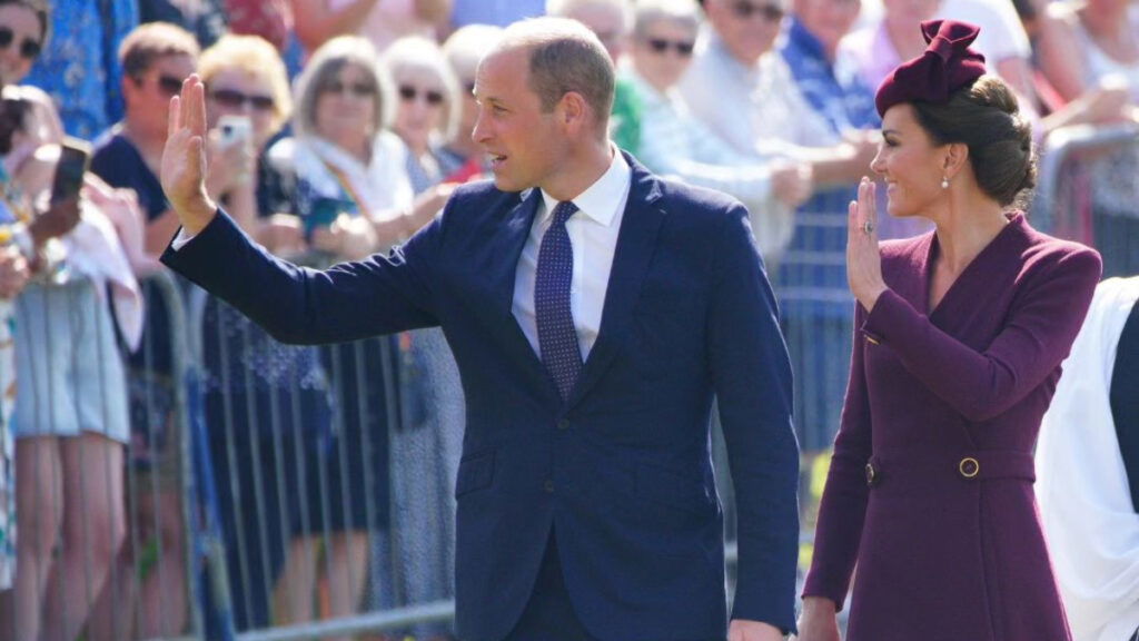 Kate Middleton and Prince William wave to on lookers at St David's.