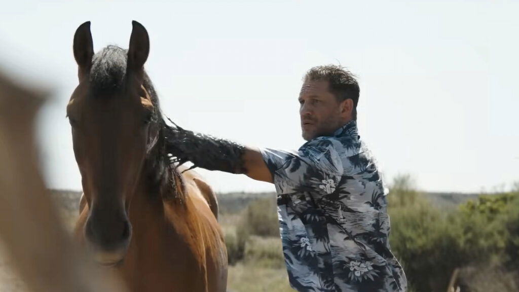 Tom Hardy with a horse in Venom: The Last Dance