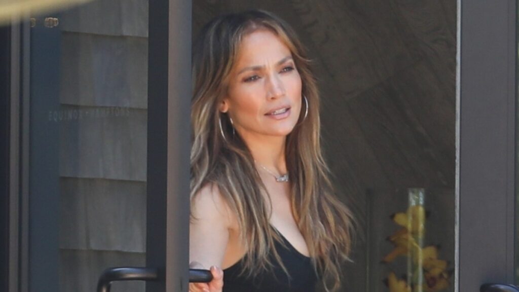 Jennifer Lopez wearing hoop earrings