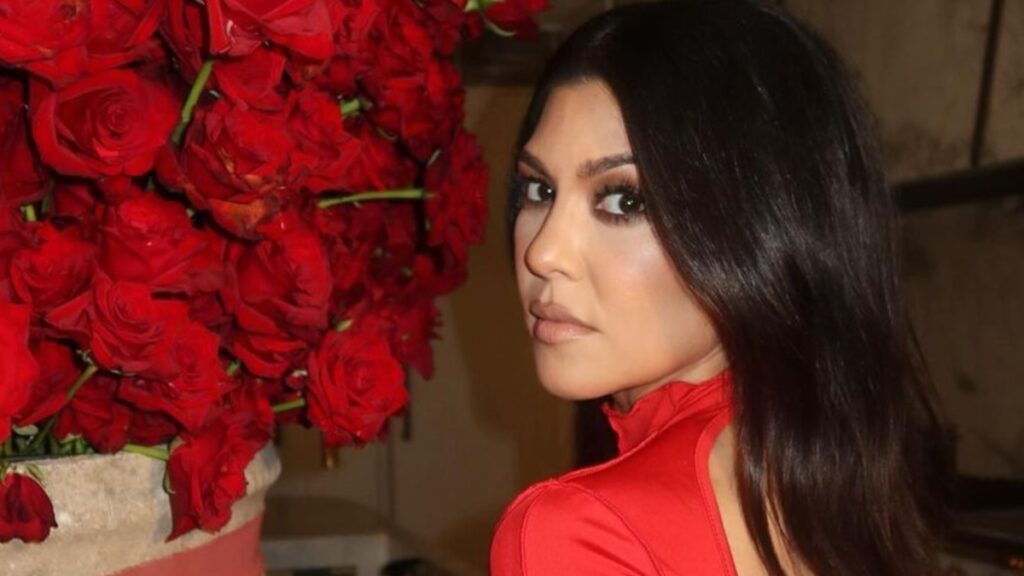 Kourtney Kardashian posing with roses