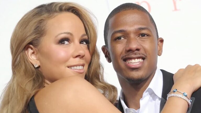 Nick Cannon and Mariah Carey posing together.