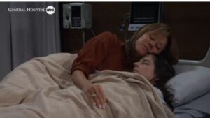 General Hospital character Alexis is overcome with grief following her daughter Sam's death.