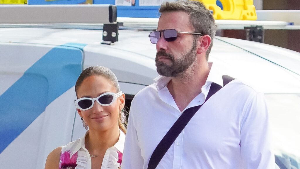 Ben Affleck looks bored during outing with Jennifer Lopez.