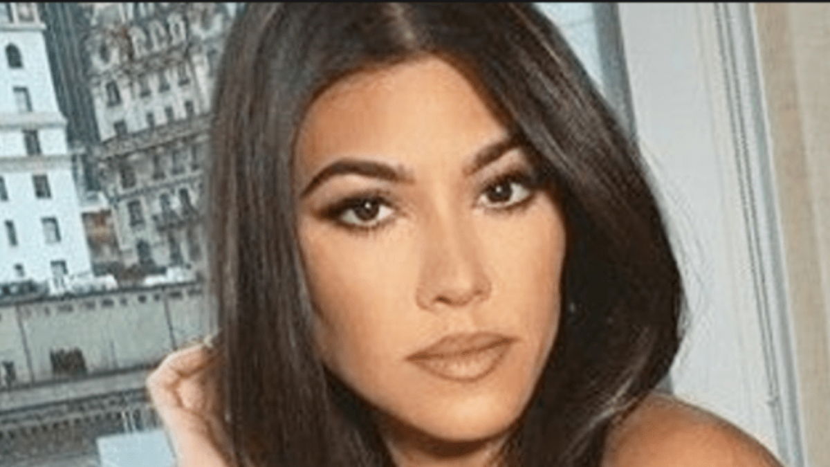 Kourtney Kardashian Sparks Outrage With Leggy Bath Snap In Fishnets