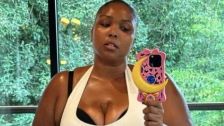 Lizzo poses for a selfie to show her transformed appearance