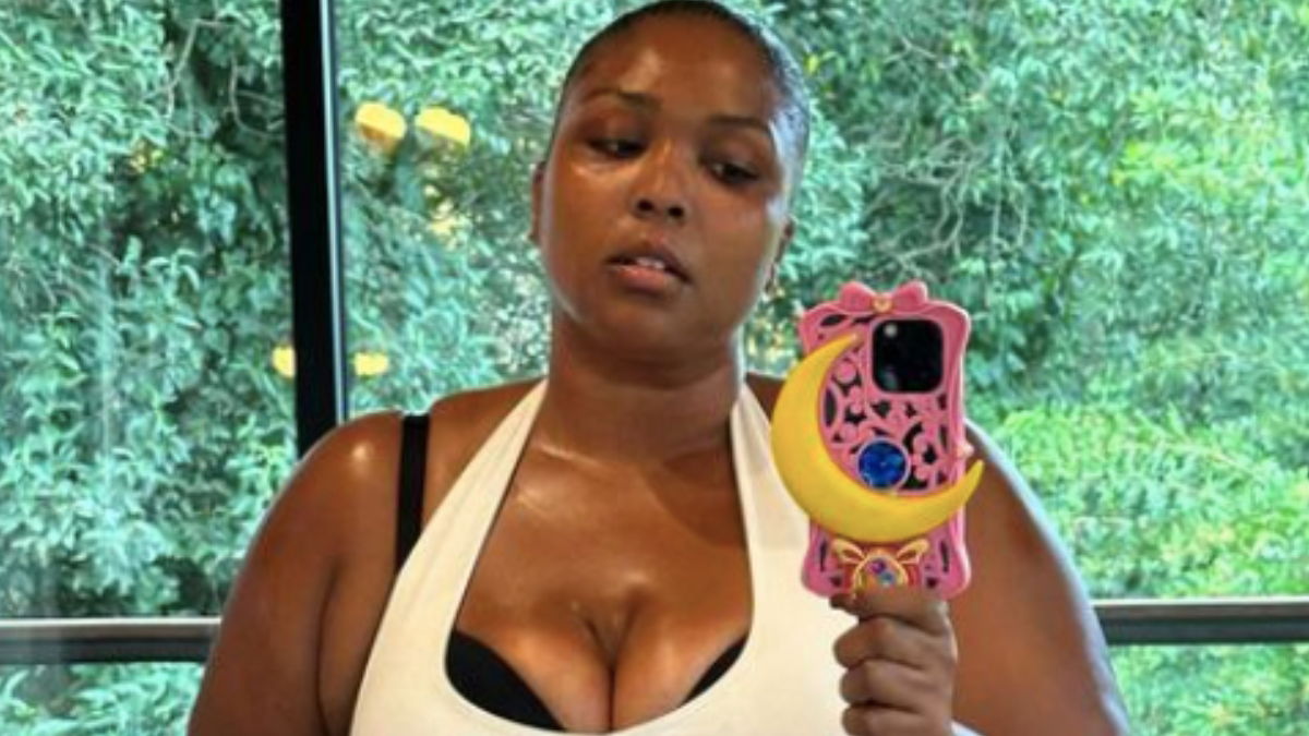 Lizzo Looks Fine as Heck in an Orange Dress but Some of Her Fans Are Mad About Her Body Transformation: ‘You Never Really Loved Yourself’