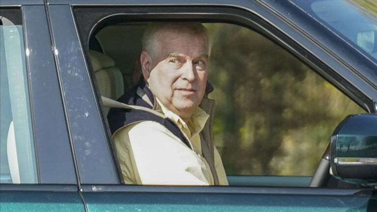 Prince Andrew driving down the Long Walk at Windsor this morning had to stop as woman was distracted on her mobile phone.