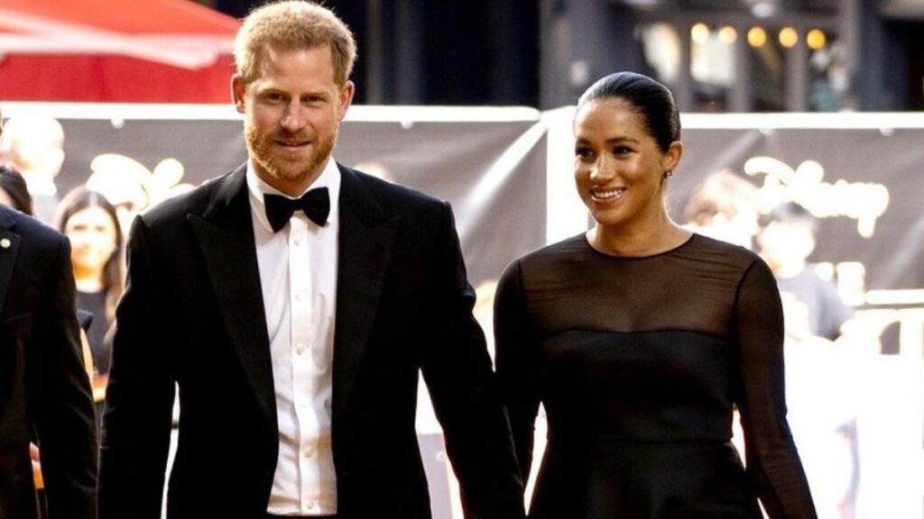 Prince Harry and Meghan Markle attend The Lion King premiere in coordinating formal outfits.