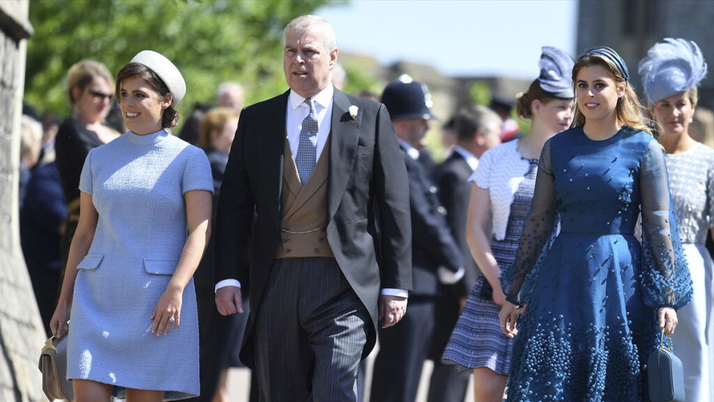 Princess Eugenie, Prince Andrew and Princess Beatrice attend the Royal Wedding of Prince Harry to Meghan Markle at St George's Chapel, Windsor Castle