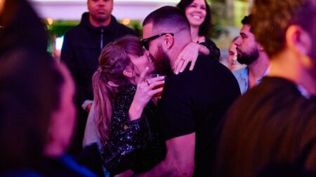 Taylor Swift and Travis Kelce kiss in a club after his Super Bowl win