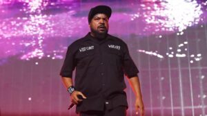 Ice Cube performing on stage.