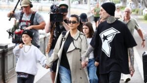 Kourtney Kardashian and Travis Barker with Reign Disick