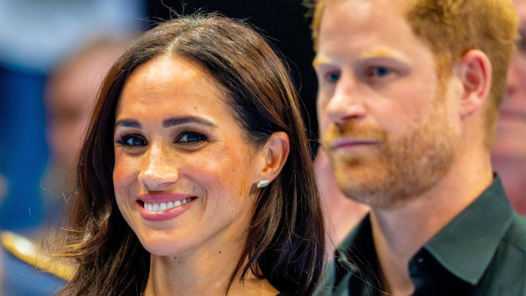 Meghan Markle Smiling in Front of Prince Harry