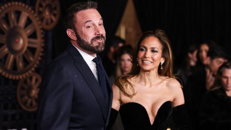 Ben Affleck and Jennifer Lopez smile.