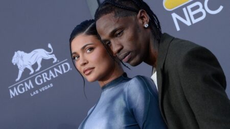 Kylie Jenner and Travis Scott on red carpet.