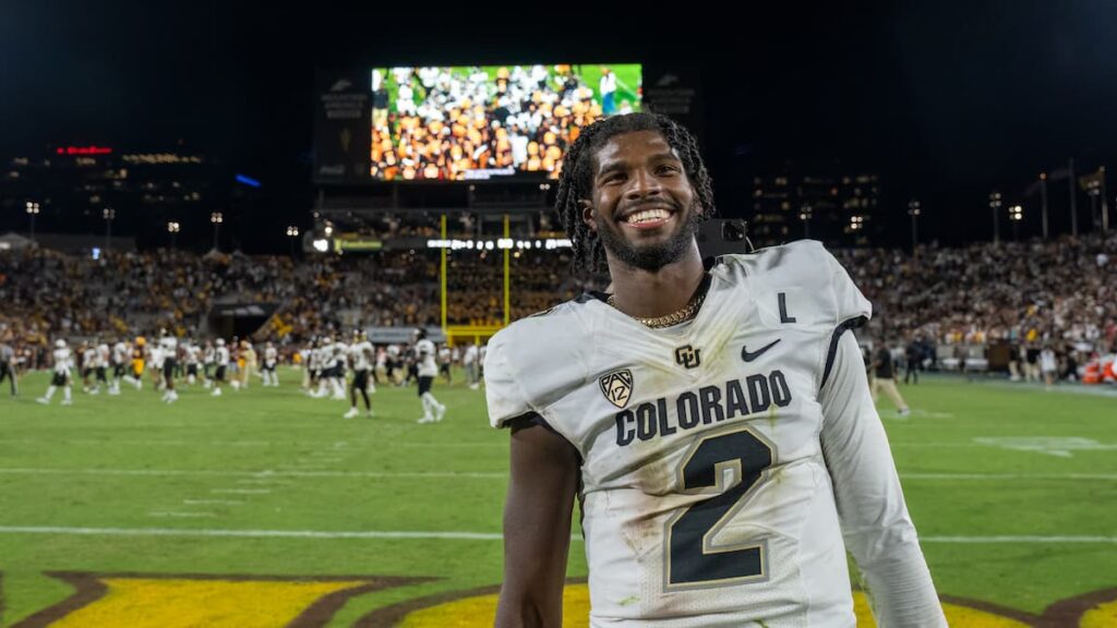 Sheduer Sanders posing for a photo after a game.