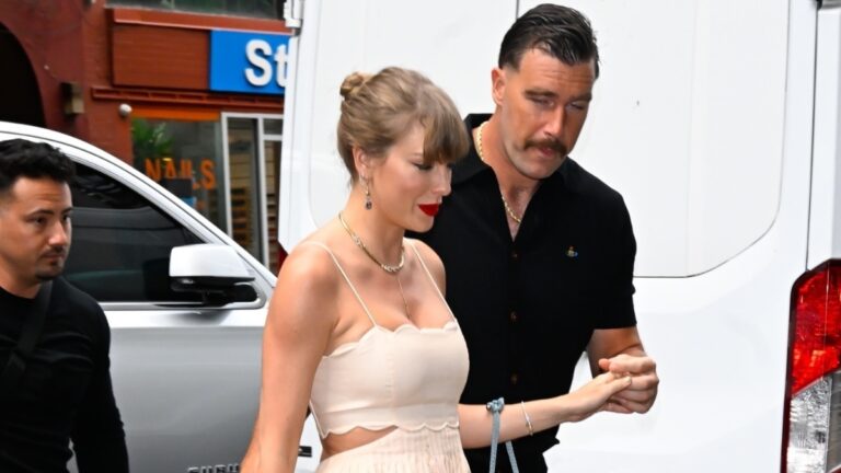 Taylor Swift and Travis Kelce attend an event