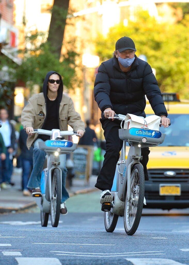 *EXCLUSIVE* Leonardo DiCaprio and Vittoria Ceretti enjoy a stroll and bike ride in NYC with his 17 year-old niece Normandie Farrar after enjoying their Italian vacay